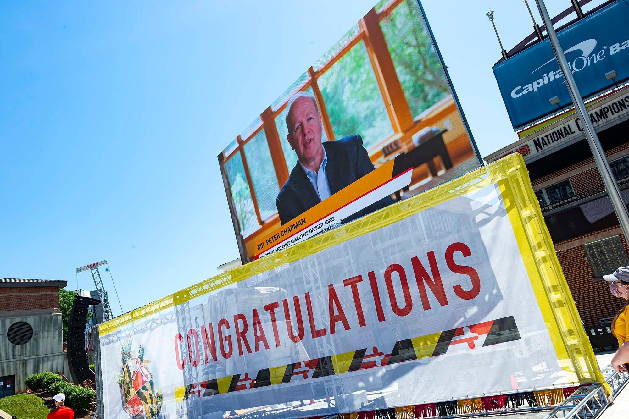 A speaker wishes graduates congratulations